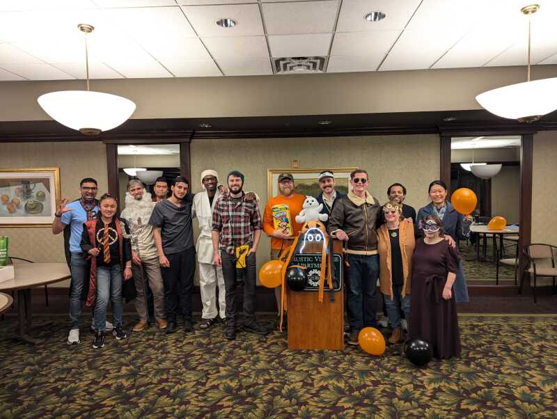 Village toastmaster members wearing halloween costumes.